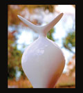 Utterly alluring, with a winged neck, this vase ha